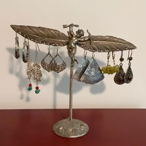 Cherub earring display with jewelry